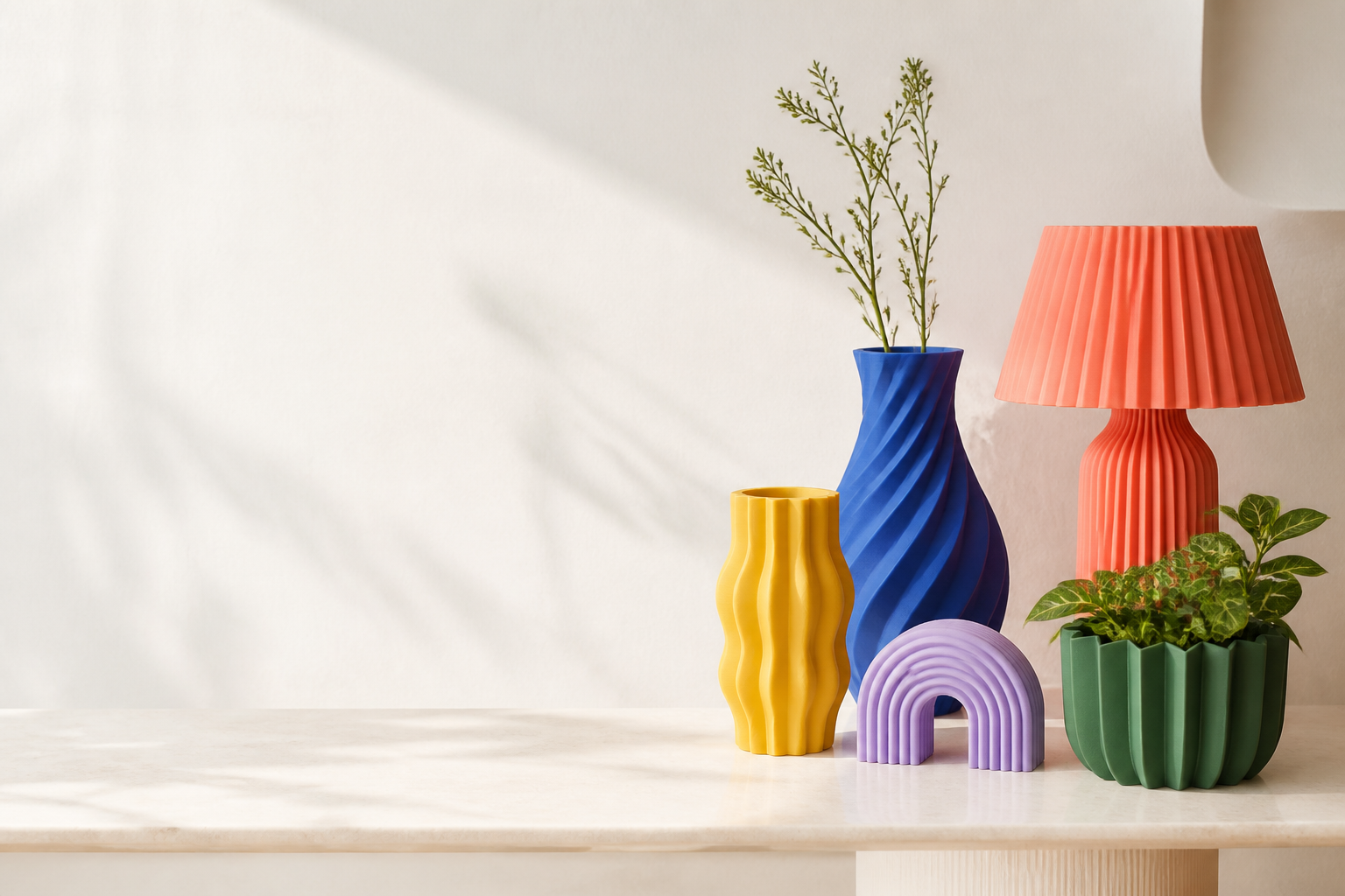 A colourful Pink Bnana-inspired arrangement of home pieces
