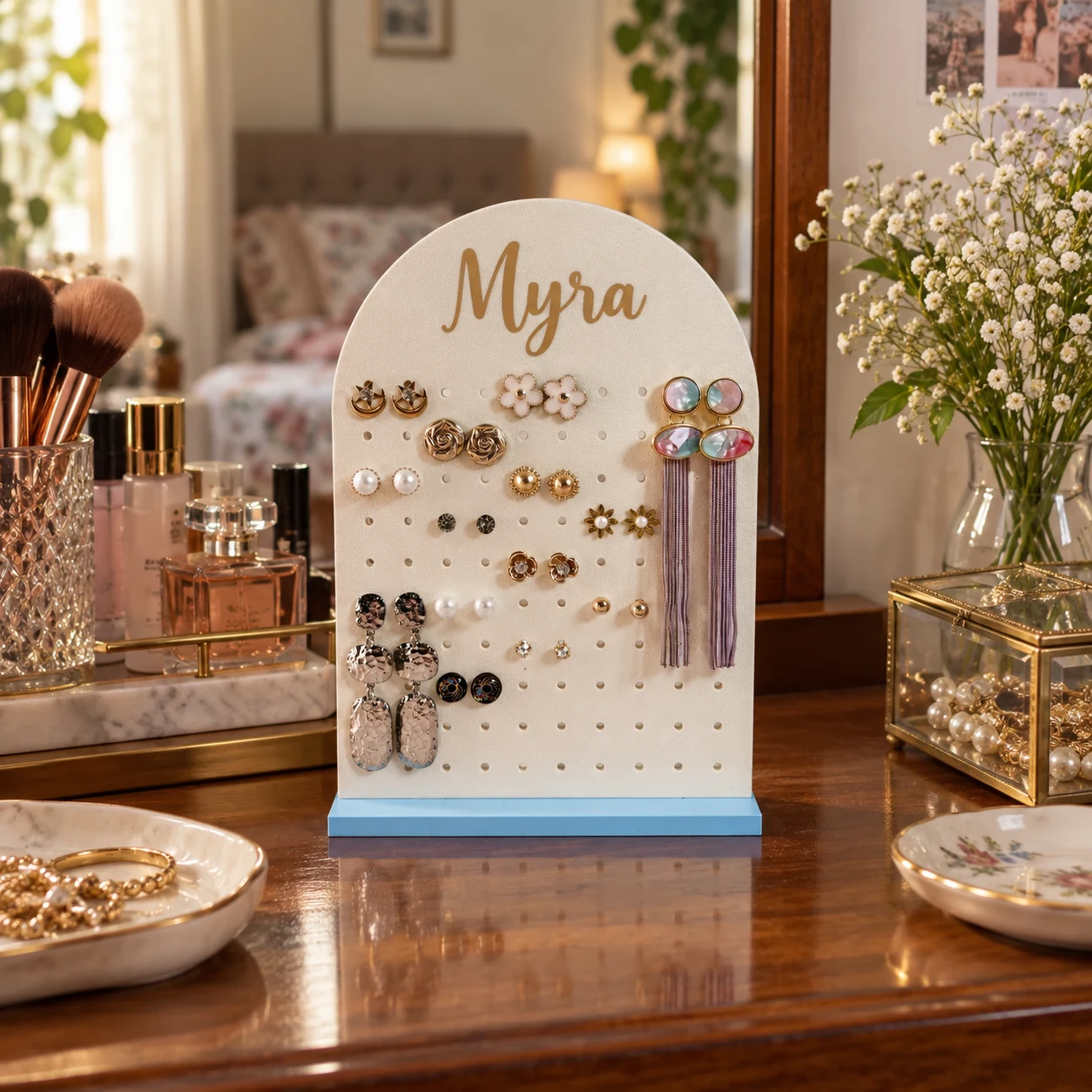 Sky blue personalised earring organizer displayed on a dressing table
