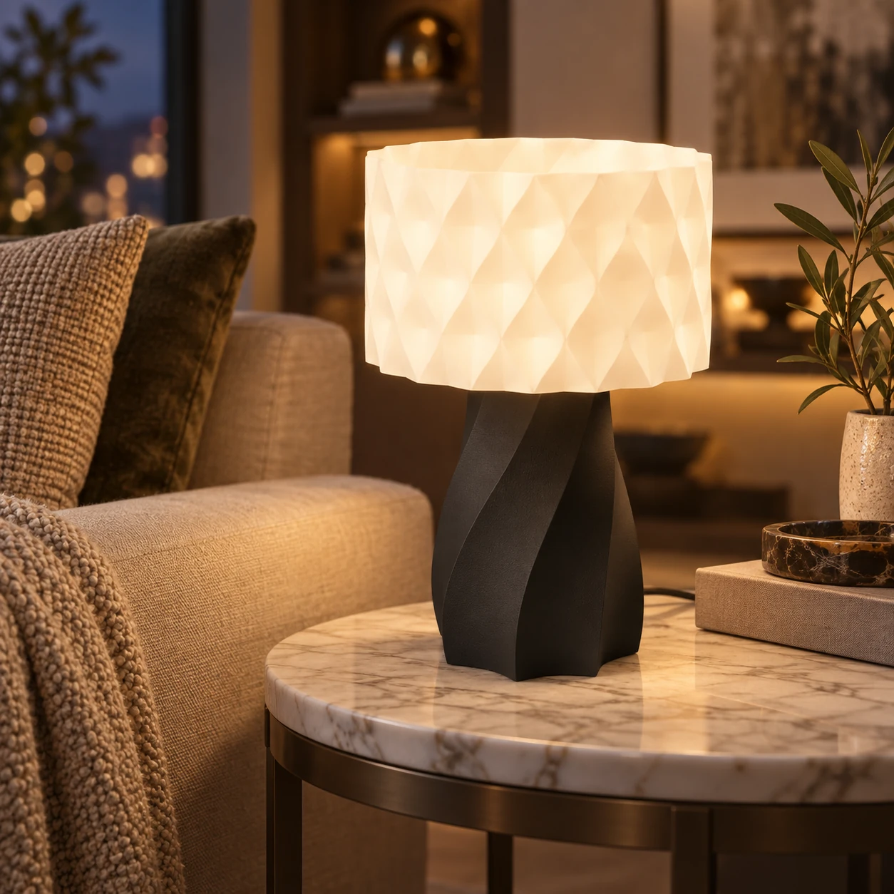 Pink Bnana Twirl Glow Table Lamp with black base glowing on a living room side table